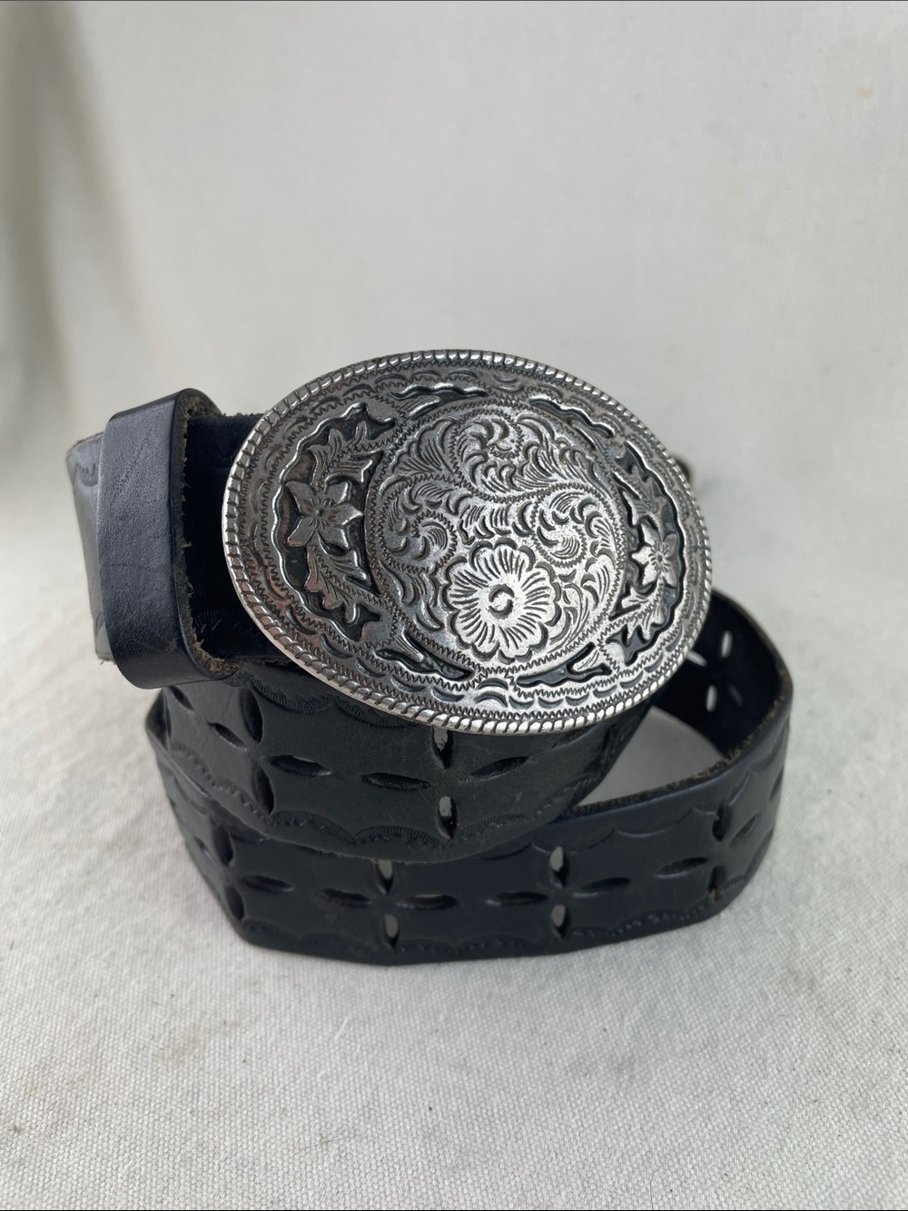 Tooled Black Leather Belt with Ornate Silver Oval Buckle